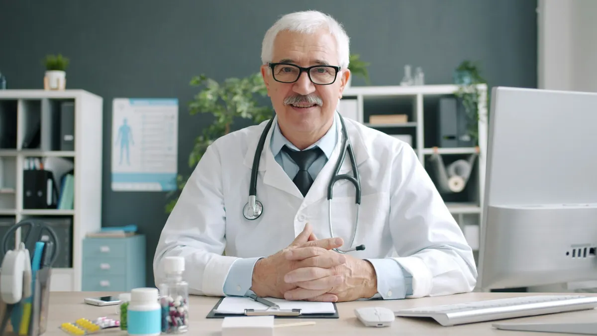 Provider smiling during an online visit